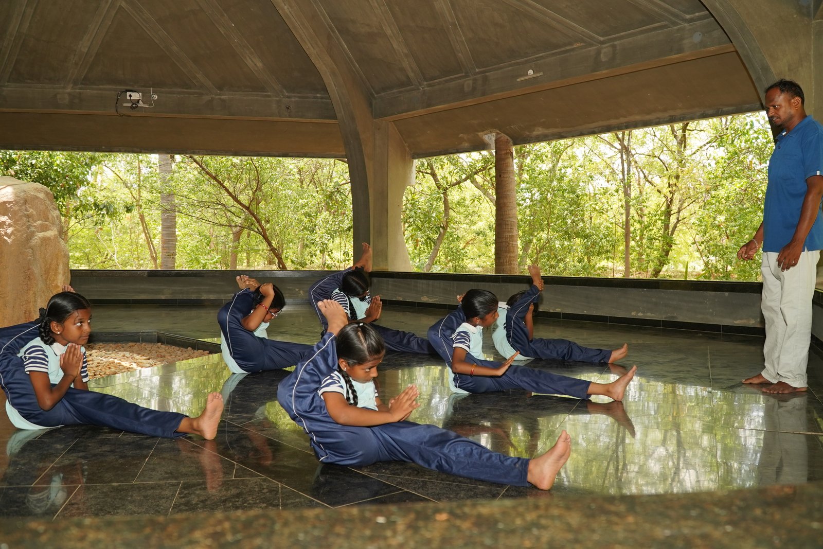 Students practising yoga